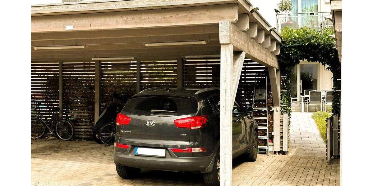 Exklusive EG-Wohnung mit Hauscharakter: 46 m² überdachte Terrasse, Garten, A+ Energie, 2 Carports 4 zimmer