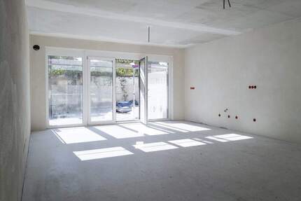 Ihr neues Zuhause mit Garten - moderne 4-Zimmer-Wohnung im Effizienzhaus 40 4 zimmer