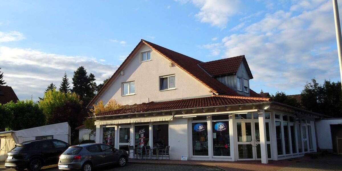 Wohn- und Geschäftshaus in zentraler Lage von Herzogenaurach-Lohhofgebiet 8 zimmer