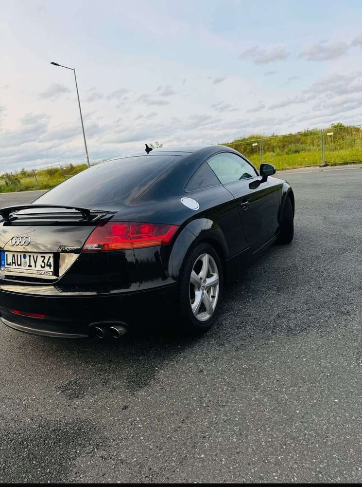 TT