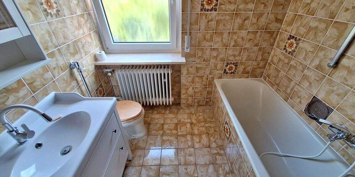 Perfekt für die Familie: Reihenmittelhaus in guter und ruhiger Lage mit Garten und Garage 3 zimmer