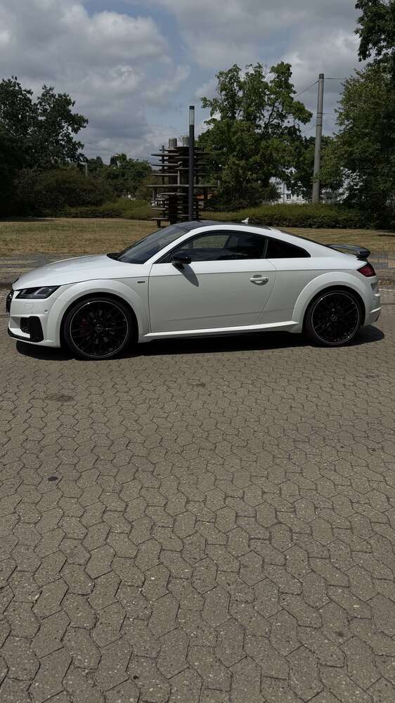 TT
