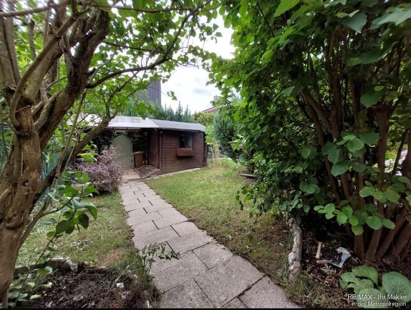 Reihenmittelhaus mit 5 Zimmern, Garten und Garage