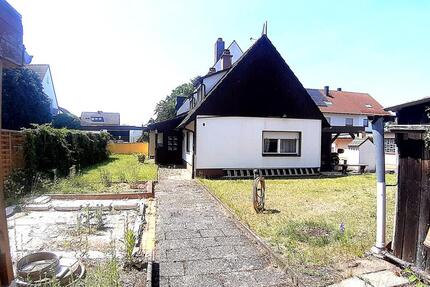 Kleines Einfamilienhaus mit Wintergarten und überdachter Terrasse