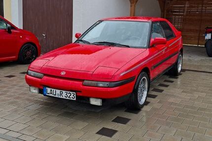 Mazda 323 74.298 km 7.000 &euro; Schwaig 90571