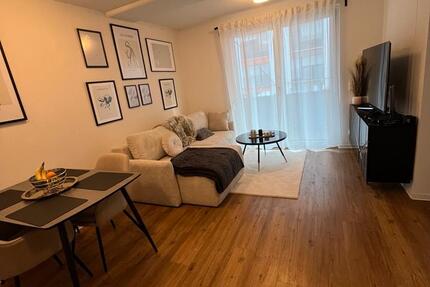 Möbilierte 1,5 Zi Neubau Whg mit EBK, Balkon u Tiefgarage 1.5 zimmer