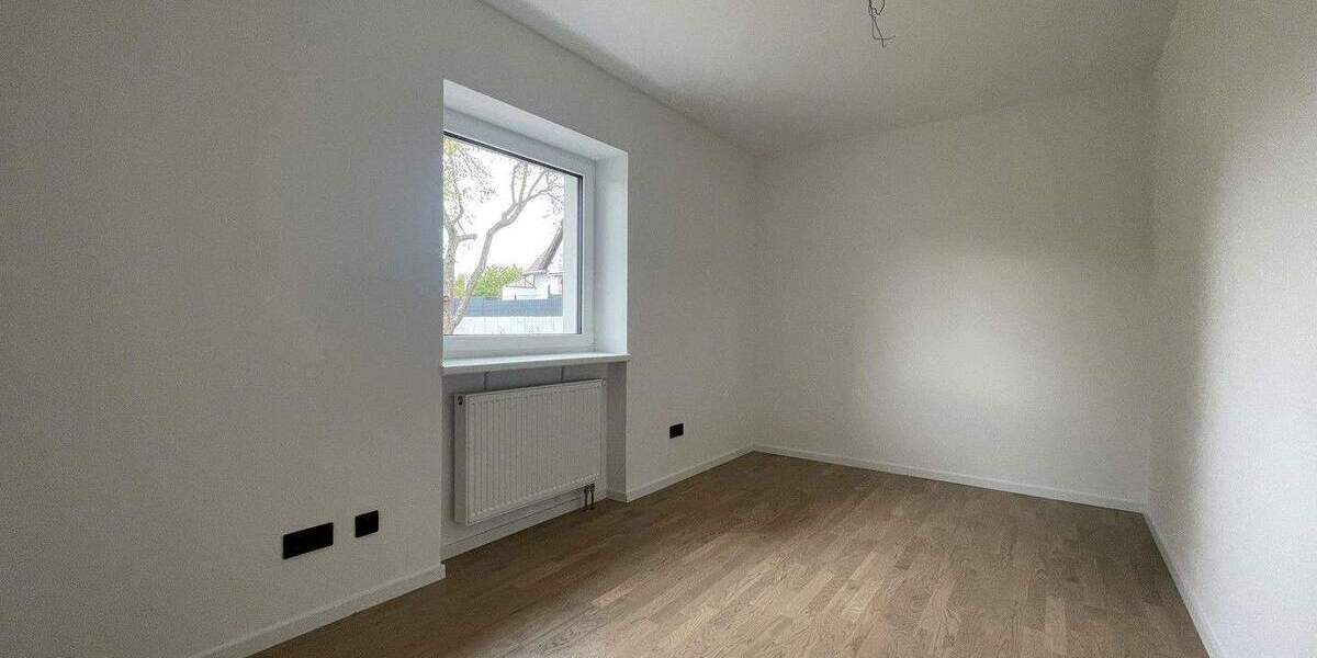 Hochwertige, energetisch sanierte 5-Zimmer-EG-Wohnung mit Balkon, Garten u. 2 Garagenstellplätzen 5 zimmer