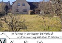 Einfamilienhaus mit Garage und Garten
