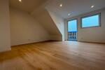 Exklusive Dachgeschosswohnung mit zwei Balkonen – Erstbezug nach 2 zimmer