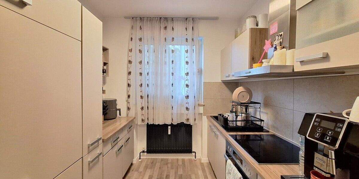 TOP 3-Zimmer Wohnung im Hochparterre mit Balkon und Einzelgarage in ruhiger Lage 3 zimmer