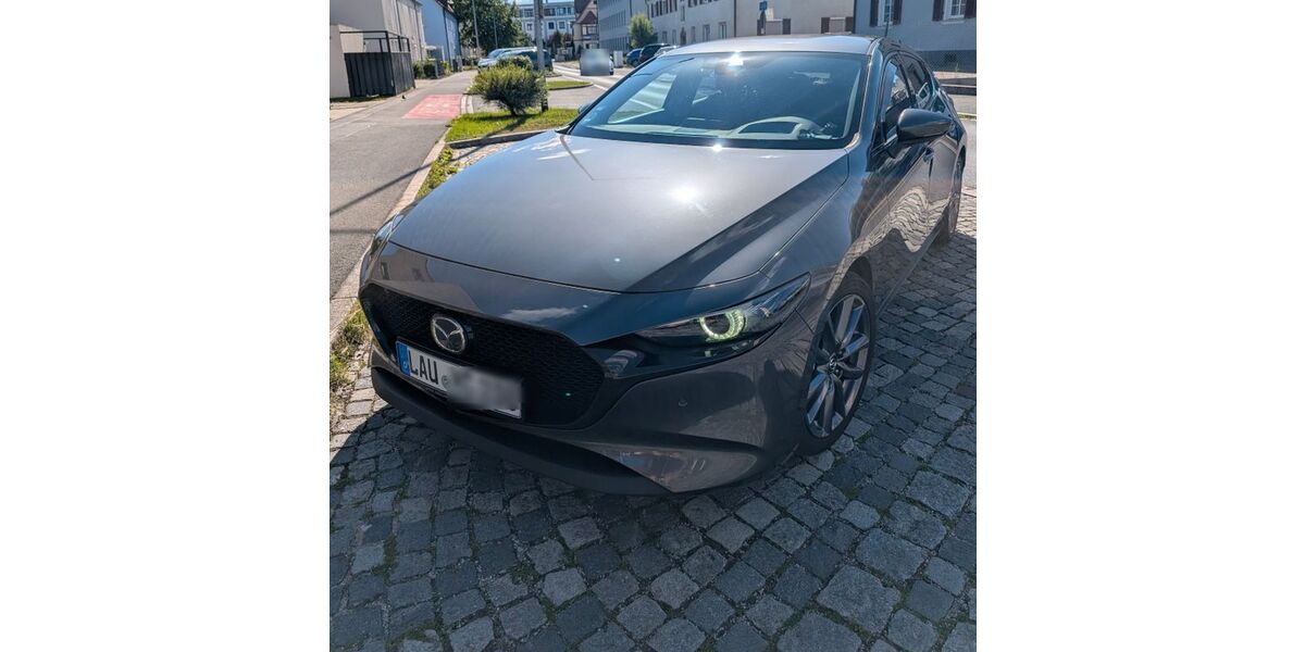 Mazda 3 101.000 km 15.900 &euro; Lauf 91207