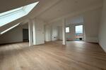 Exklusive Dachgeschosswohnung mit zwei Balkonen – Erstbezug nach 2 zimmer