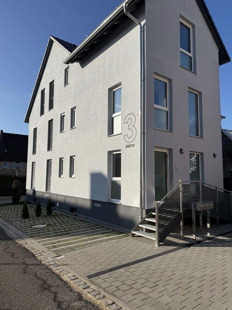 Erstbezug 3 Familienhaus + Lift+ Garagen +Keller+Stellplatze 1 zimmer